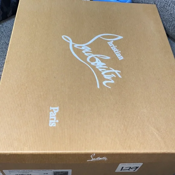 Christian Louboutin Metallic Silver Heels with Iconic Red Soles - Picture 9 of 9